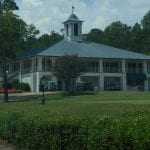 Country club with custom metal roofing laid do wn by Creed & Garner Roofing Company Inc. in Aberdeen, NC.